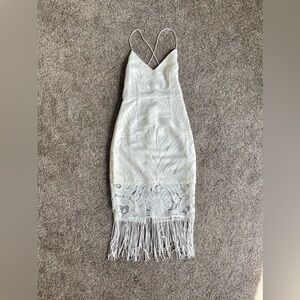 White lace Two Sisters dress with fringe bottom